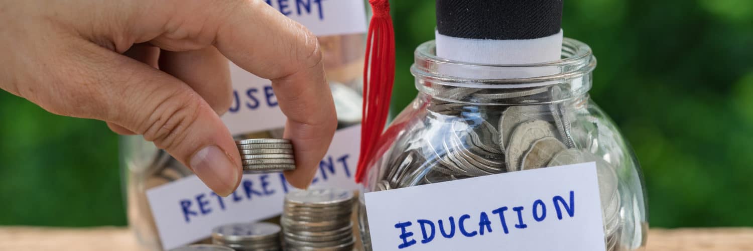 One jar full of money says retirement while another says education